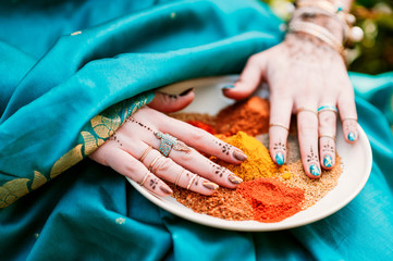 Heap of dry indian spices on a plate