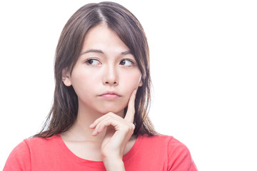 Fototapeta premium Chinese woman with hand on face, thinking