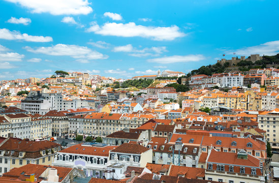 Lisbon, Portugal city skyline over Santa Justa Rua.