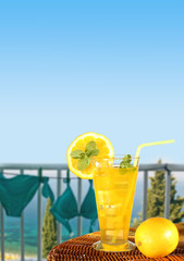 Summer drink with blur beach on background