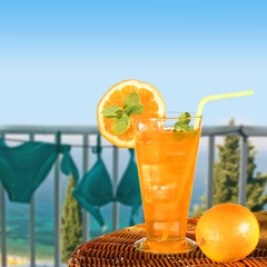 Summer drink with blur beach on background