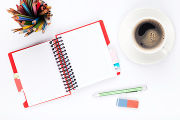 Office desk table with supplies and coffee cup