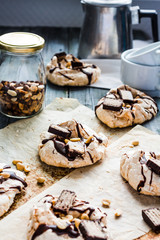 meringue with chocolate, caramel and nuts, sweet dessert