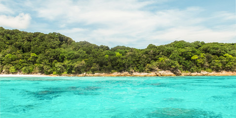 Fototapeta na wymiar Tachai Island in Andaman with Crystal Clear Sea in Sunny Day