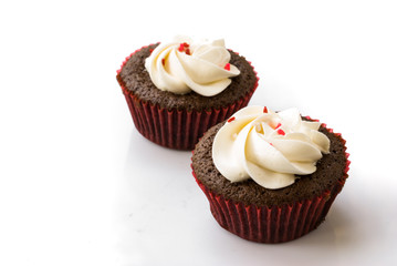 Red velvet cupcake closeup. Filtered to look like an aged instan