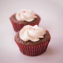 Red velvet cupcake closeup. Filtered to look like an aged instan