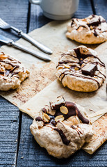 vanilla meringue with chocolate, caramel topping and nuts, sweet