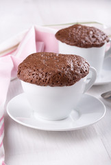Fototapeta na wymiar Quick chocolate cake in a mug