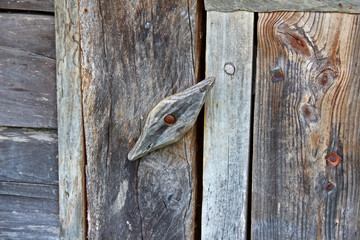Wooden turntables closeup at door in rustic style