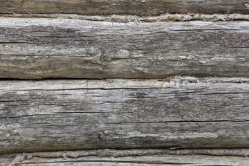 Texture of wooden boards with strips of fabric