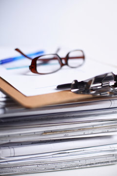 Big stack of papers ,documents on the desk