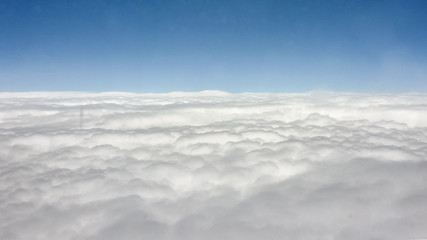 Big Clouds and Sky from Window Plane