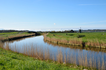 beautiful canal with wind mill