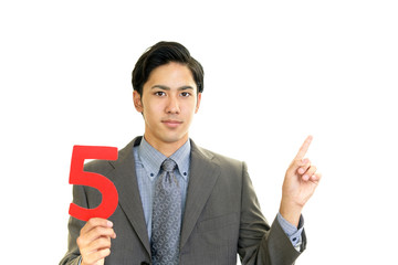 数字を持つビジネスマン