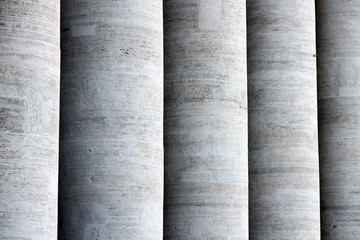 A line of Roman style columns along the corridor