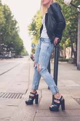 Beautiful girl posing in the city streets