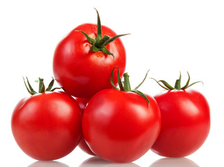 Fresh tomatoes with green leaves