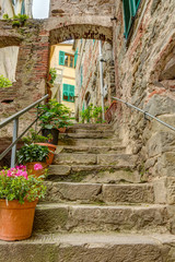 Fototapeta na wymiar Alley in Italian old town Liguria Italy