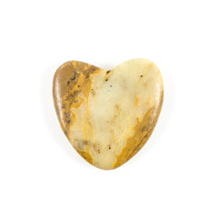 Heart shaped stone on white background
