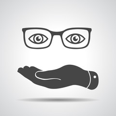 flat hand represents glasses with eyes icon - vector illustratio