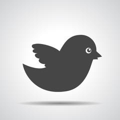 black bird icon on a grey background