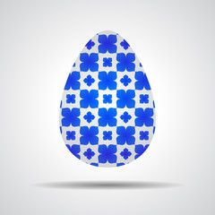 Easter egg sign icon with blue flowers pattern. Easter tradition