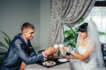 Charming bride and groom on their wedding celebration in a