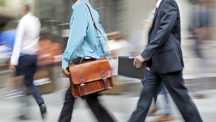 abstract image of business people in the street and modern style