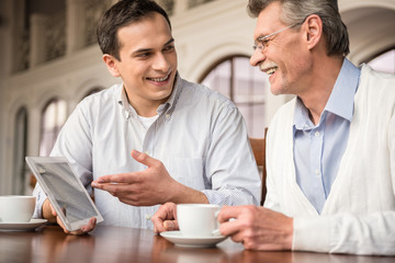 Businessmen in cafe