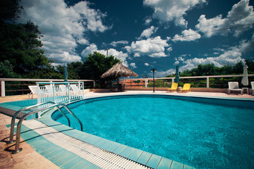 Swimming pool with stair at hotel