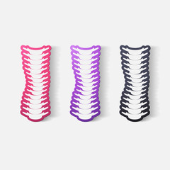 Paper clipped sticker: with the curvature of the spine to the