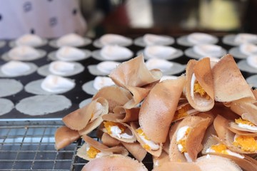 close up of thai crispy pancake - cream crepes