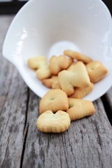 Salty crackers delicious is on the wood background
