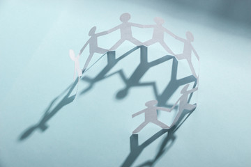 Group of people holding hands
