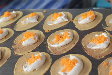 close up of thai crispy pancake - cream crepes