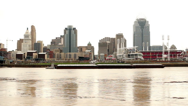 Flooded River Flows Barge Passing Cincinnati Ohio Downtown