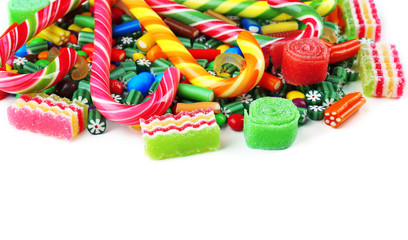 Fototapeta na wymiar Colorful candies isolated on white