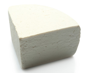 Piece of feta cheese isolated on white
