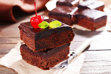 Delicious chocolate cakes on table close-up