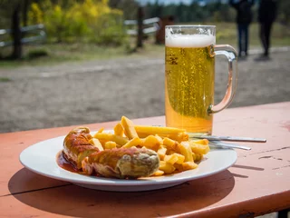Zelfklevend Fotobehang Currywurst and beer - traditional german meal © weruskak