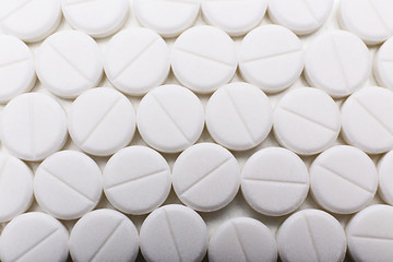 Pile of white pills, closeup
