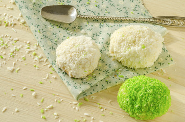Tree cookies with coconut flakes on cotton cloth