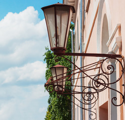 Street lamps on building forging