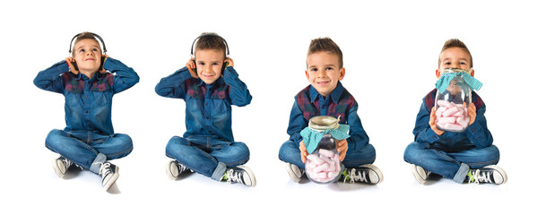Kid listening music over white background