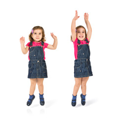 Kid jumping over isolated white background