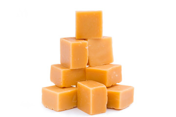 Tasty toffees on a white background.
