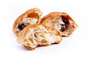 Tasty croissant on a white background.