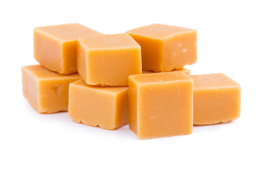 Tasty toffees on a white background.