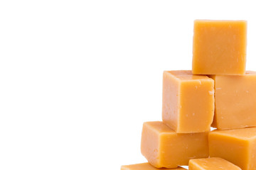 Tasty toffees on a white background.