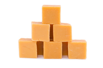 Tasty toffees on a white background.